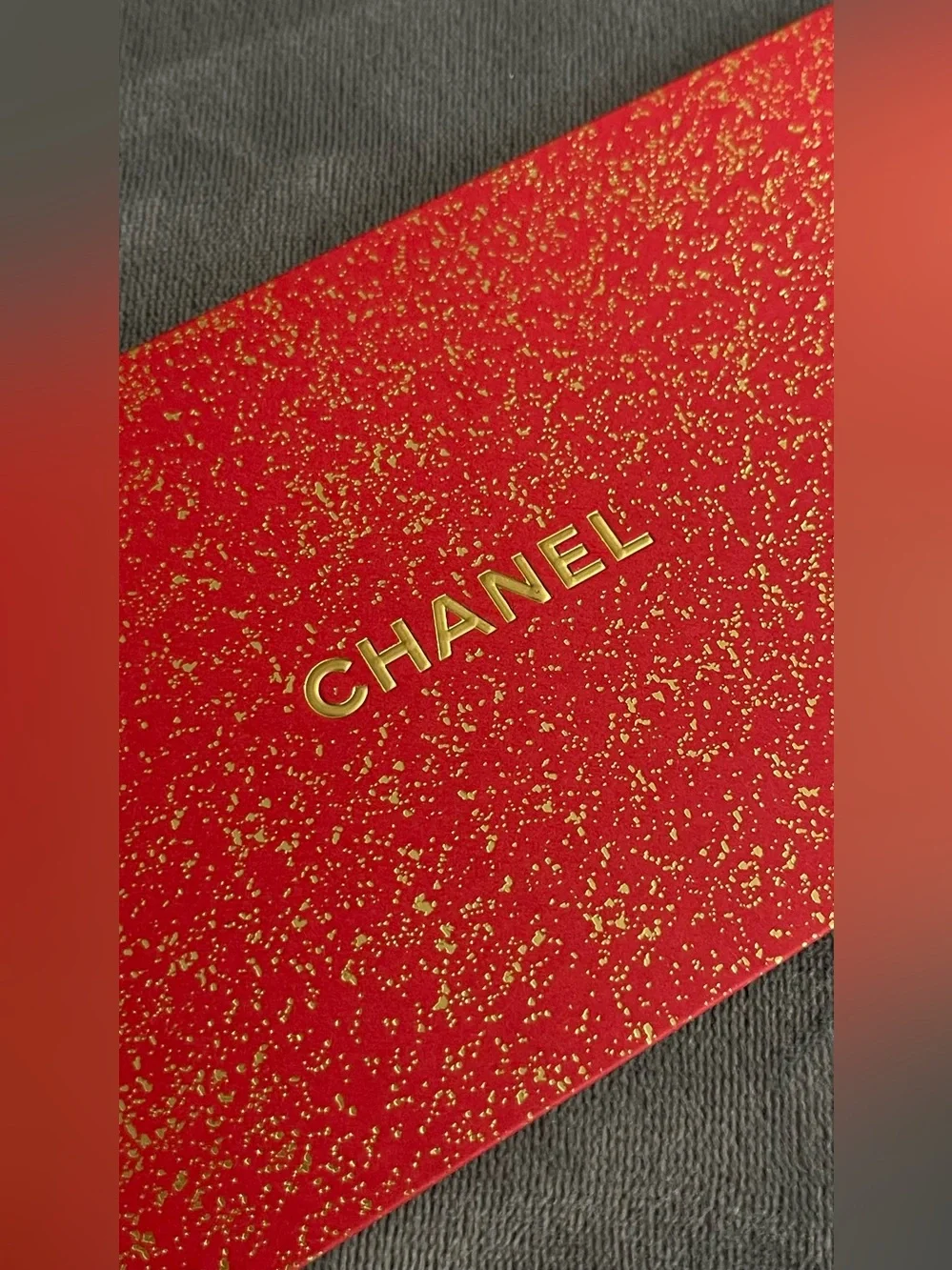 CHANEL Red Glitter Envelope with Gold CC Logo